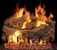 Burning gas fireplace with ceramic logs and flames.