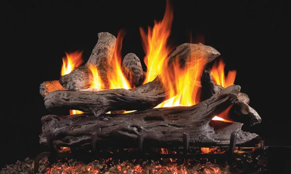 Burning gas fireplace with orange and yellow flames against a black background.