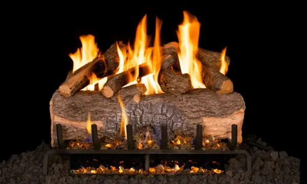 Burning gas fireplace with ceramic logs. Flames and glowing embers.