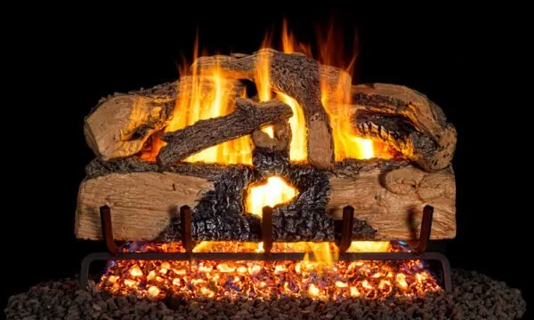 Gas fireplace with burning artificial logs, flames, and ember bed.