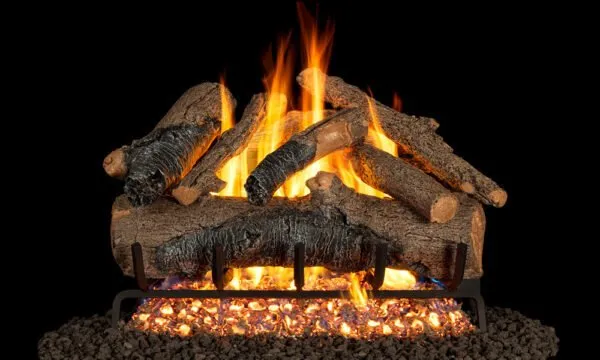 A gas fireplace with burning logs and glowing embers against a black background.