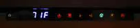 Thermostat screen displaying 7 icons and a temperature of 71F.