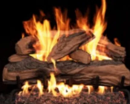 Fireplace with burning logs, flames in orange and yellow, dark background.