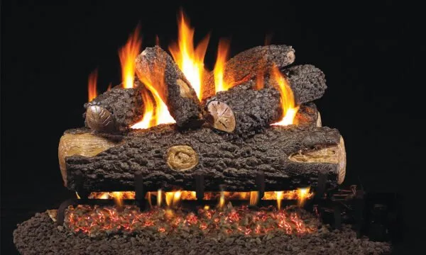 Burning gas fireplace logs with flames against a dark background.