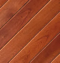 Diagonal wood flooring pattern, varying shades of brown.