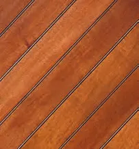 Diagonal wood flooring with dark lines separating planks, warm brown color.